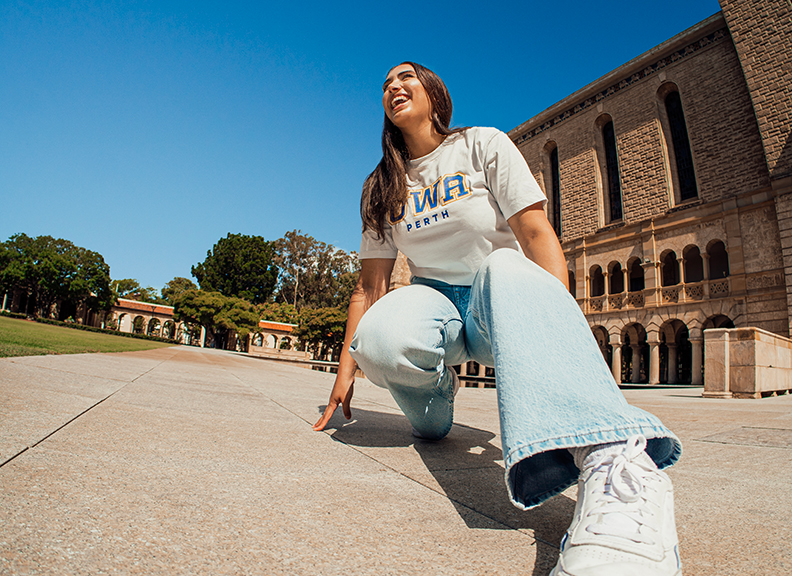 Female student infront of winthrop hall