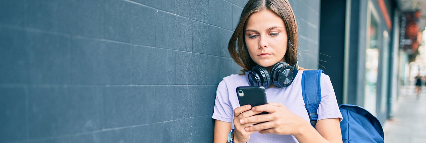 University student using her phone