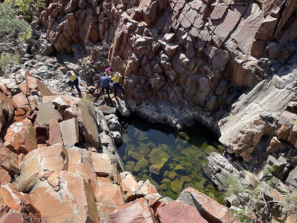 team members in a gorge