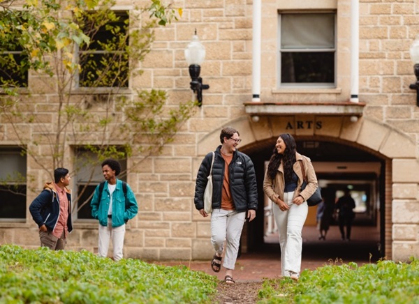 students walking through campus