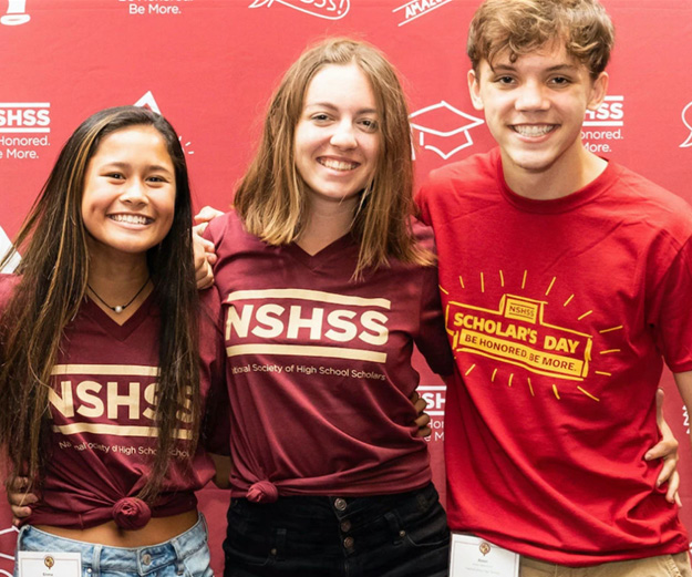 Three students from the National Society of High School Scholars