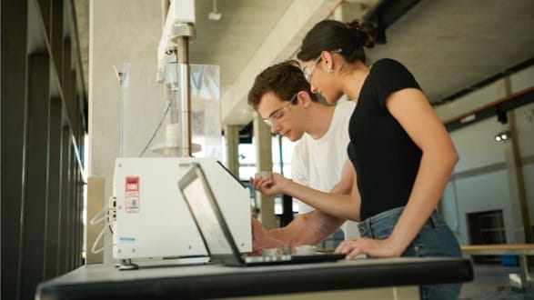 students using a 3d printer