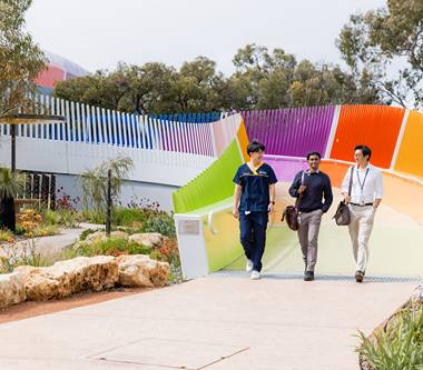 Medical students walking down ramp