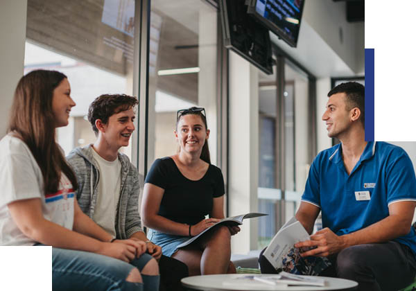 A UWA staff member talking with future UWA students