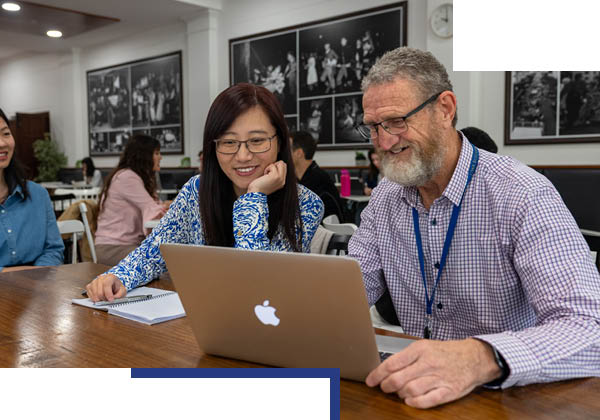 UWA staff members talking together