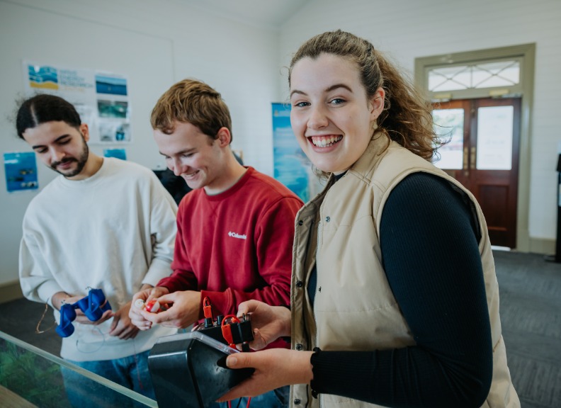 image of three students in lab