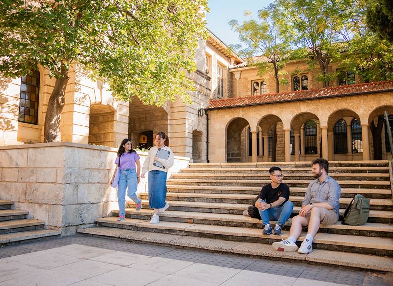 students walking and talking on steps