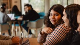 Students sitting at table 